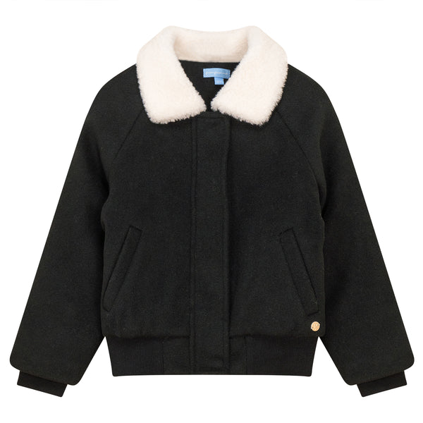 Chaqueta con pompones
